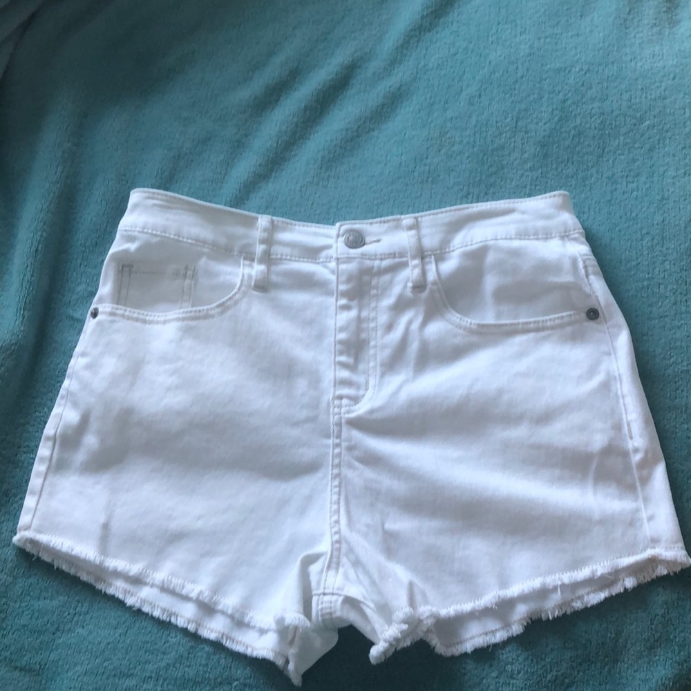 White jean four pocket jean shorts.